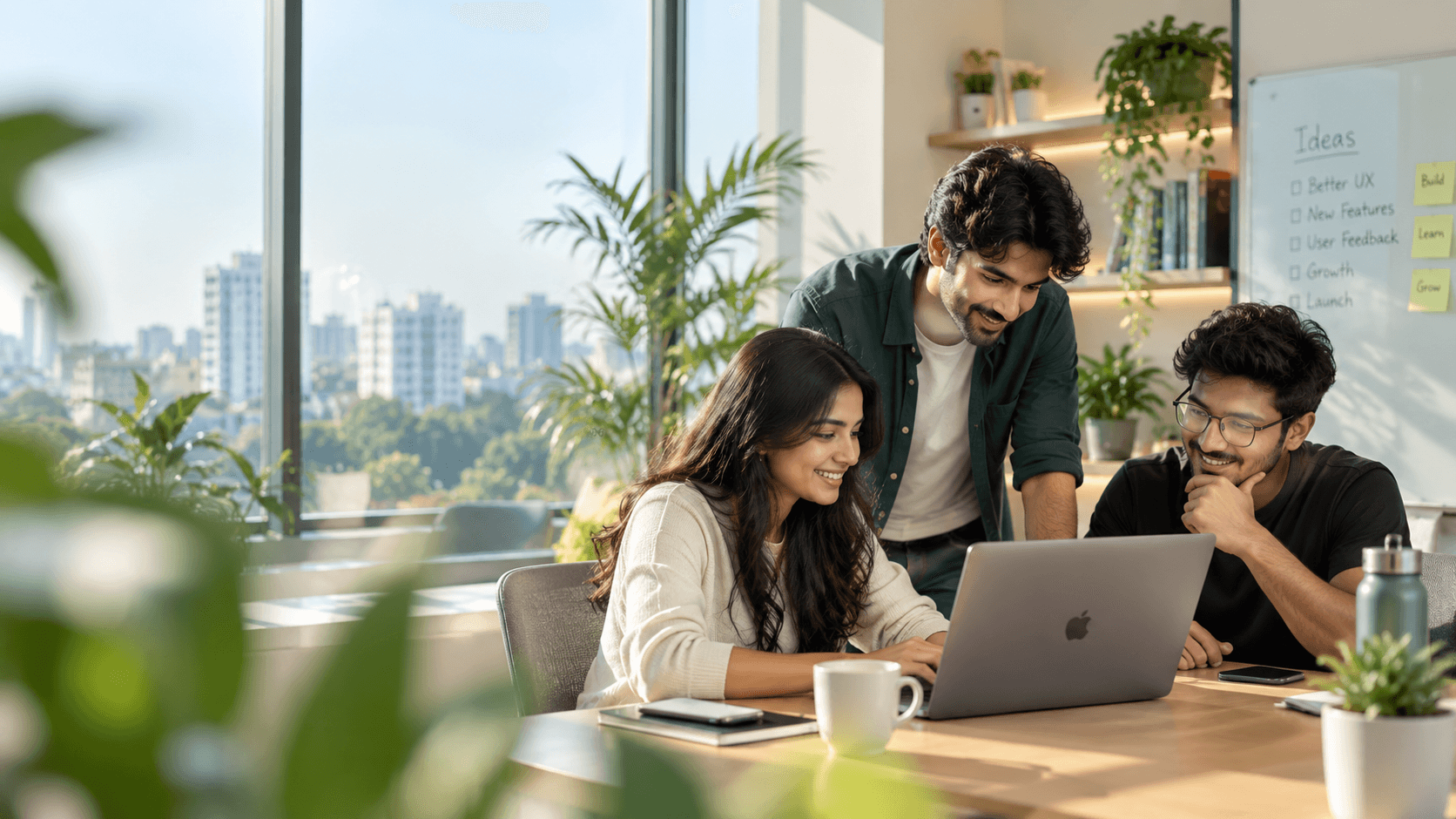 Metiva team collaborating in a modern workspace